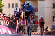 Team Movistar's Spanish rider Pelayo Sanchez celebrates as he crosses the finish line to win the 6th stage of the 107th Giro d'Italia cycling race, 180 km between Torre del lago Puccini and Rapolano Terme, on May 9, 2024. Pelayo Sanchez won the stage ahead of Team Soudal-Quick Step's French rider Julian Alaphilippe and Team Jayco-AlUla's Australian rider Lucas Plapp. (Photo by Luca Bettini / AFP)