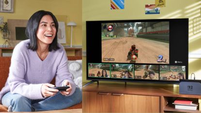 Fem presenting player with lilac jumper playing Switch 2 and Mario Kart World using GameChat 