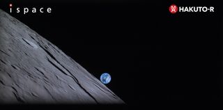 A larger image of the Earth rising over the lunar horizon