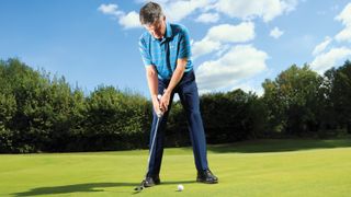 Clive Tucker demonstrates a putting drill to help consistency