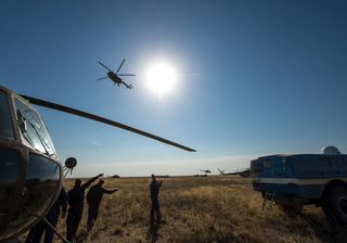 Rescue Crews Wave Farewell at Soyuz Landing Site