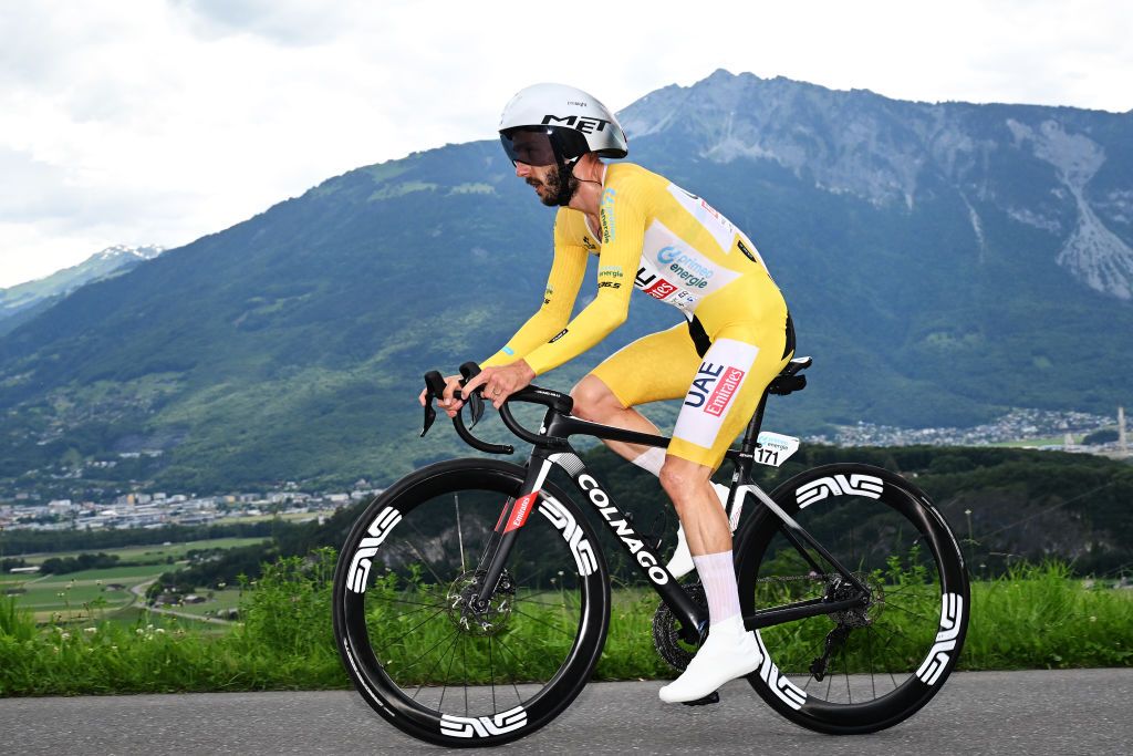 VILLARSSUROLLON SWITZERLAND JUNE 16 Adam Yates of The United Kingdom and UAE Team Emirates Yellow leader jersey sprints during the 87th Tour de Suisse 2024 Stage 8 a 157km individual time trial stage from Aigle to VillarssurOllon 1249m UCIWT on June 16 2024 in VillarssurOllon Switzerland Photo by Tim de WaeleGetty Images