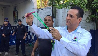 Mexican police have been armed with slingshots after failing firearms test