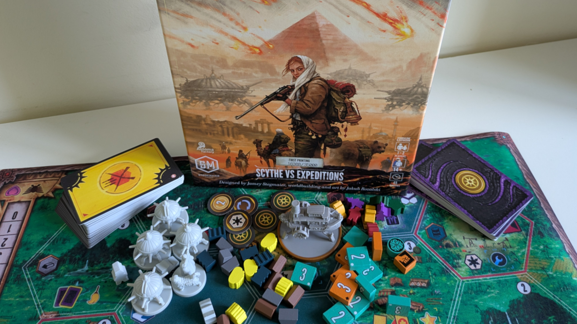 Duel of Meloch box, board, cards, and components against a plain background