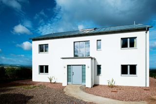 A contemporary white rendered Passivhaus self build
