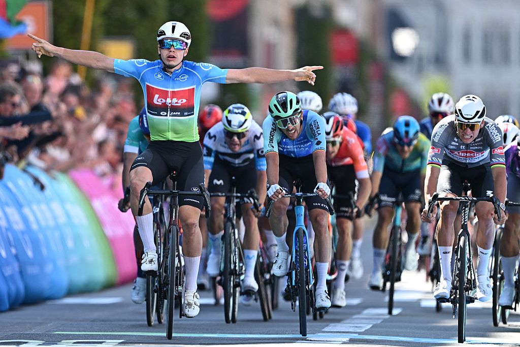 Arnaud De Lie celebrates victory in Leuven ahead of Mathieu van der Poel (right)