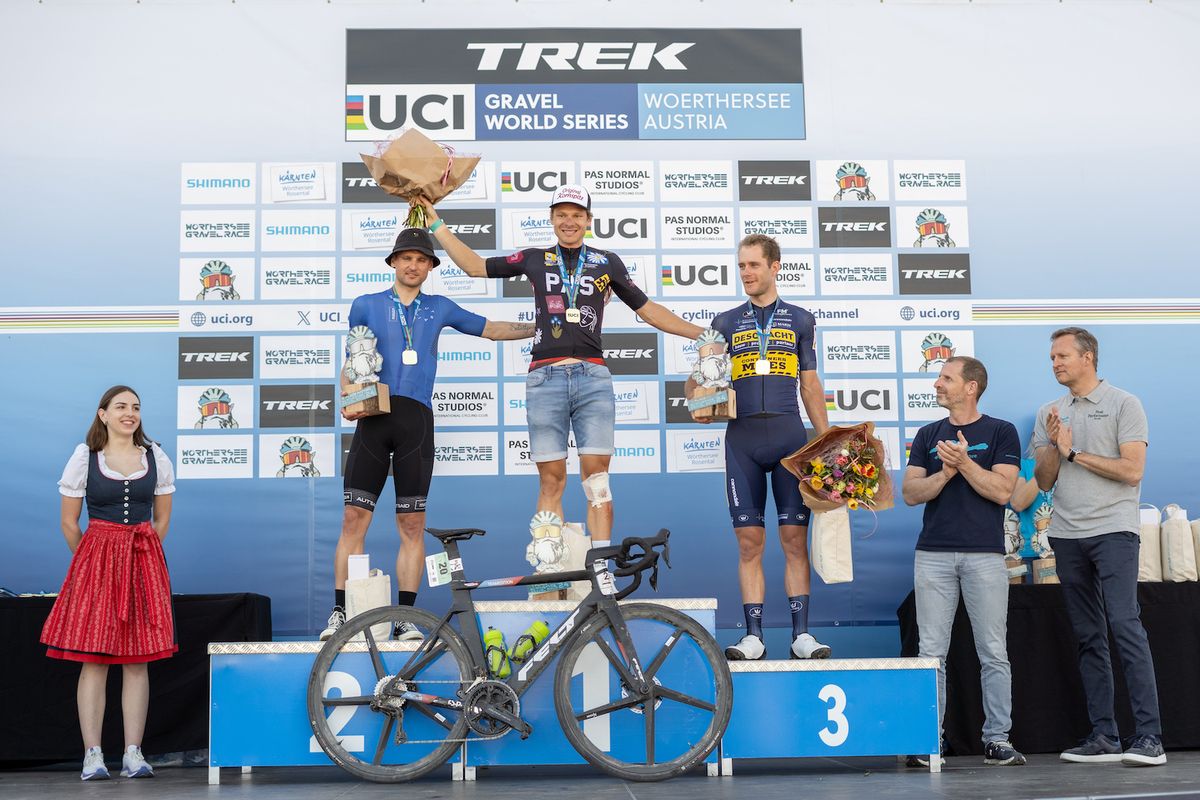 Podium of the W&ouml;rthersee Gravel Race, a new addition to the UCI Gravel World Series in 2024 &ndash; Men's Elite winner Sebastian Sch&ouml;nberger (Team Felt Felbermayr) flanked by second placed Paul Vo&szlig; (Autsaid) and third-placed Daan Soete (Deschacht Hens Maes CX)