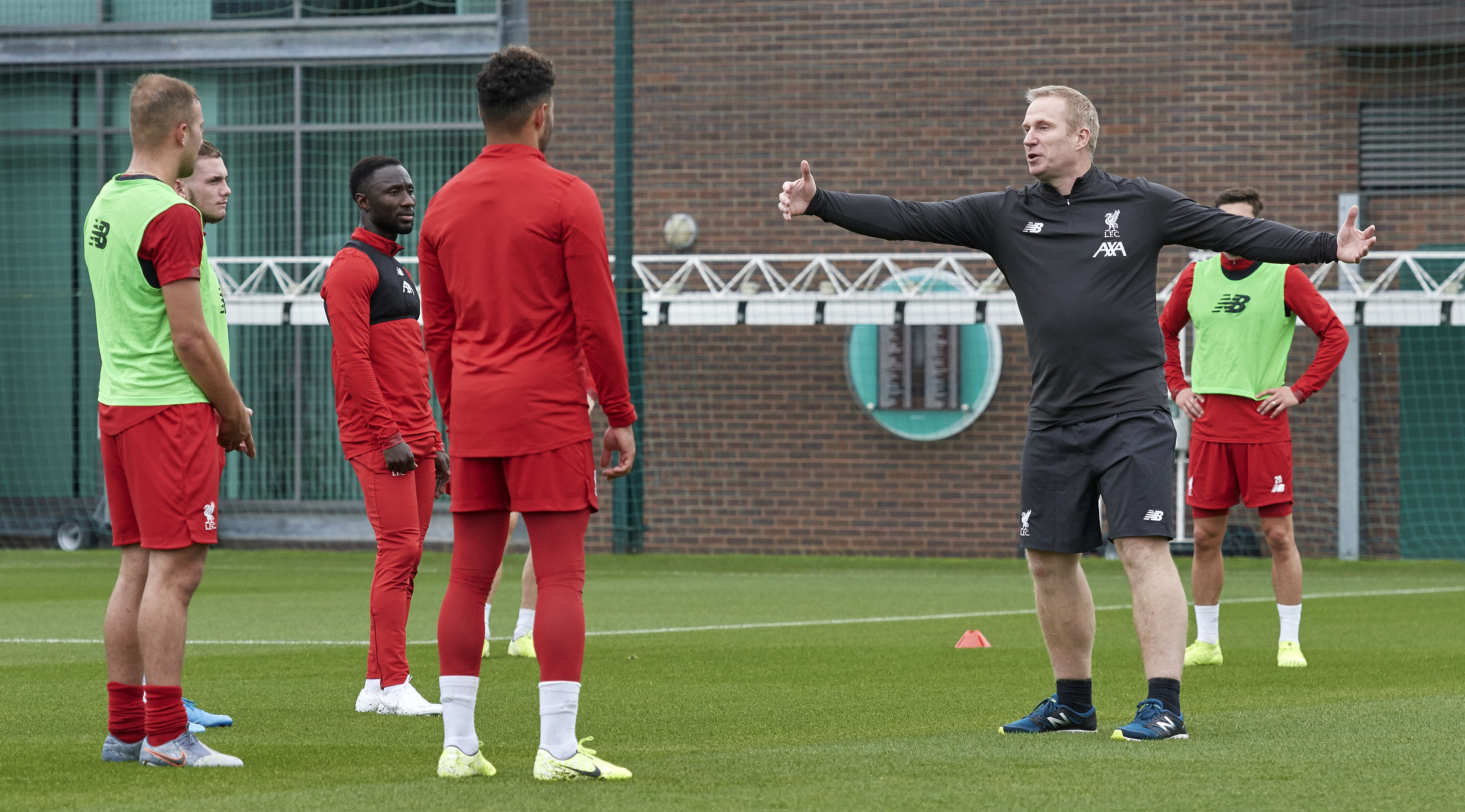 LIVERPOOL, ENGLAND - OCTOBER 15: (THE SUN OUT, THE SUN ON SUNDAY OUT) Coach Thomas Gronnemark speaks to the players of Liverpool during a training session at Melwood Training Ground on October 15, 2019 in Liverpool, England. (Photo by Nick Taylor/Liverpool FC/Liverpool FC via Getty Images)