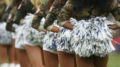 Cheerleading, Thigh, Leg, Shorts, Fashion, Uniform, Human leg, Street fashion, Majorette (dancer), Pom-pom, 