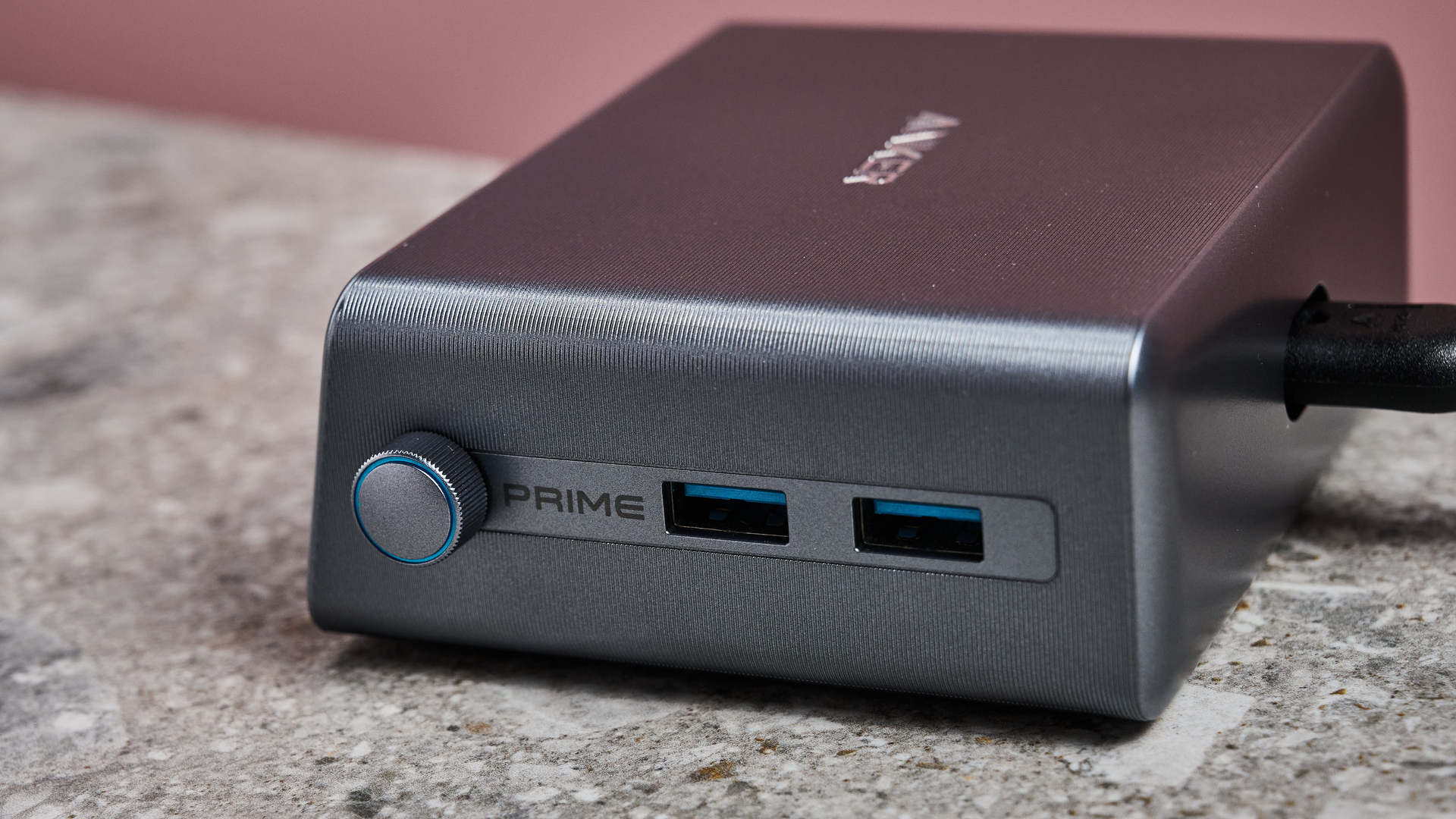 Side profile of the Anker Prime Charger 6-Port 250W Charging Station, showing the control dial and two USB-A ports