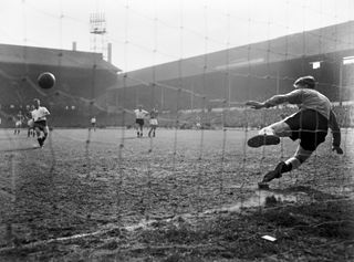 Cliff Jones scores a penalty for Tottenham against Leicester in September 1959.