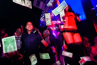 A VIP guest ‘makes it rain’ at a nightclub in Las Vegas, 2012.