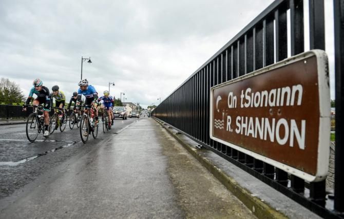 A view of the peloton as they make their way across the River Shannon
