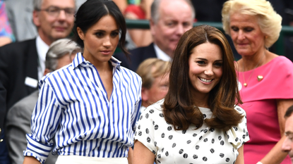 Meghan, Duchess of Sussex and Catherine, Duchess of Cambridge attend day twelve of the Wimbledon Lawn Tennis Championships at All England Lawn Tennis and Croquet Club on July 14, 2018 in London, England.