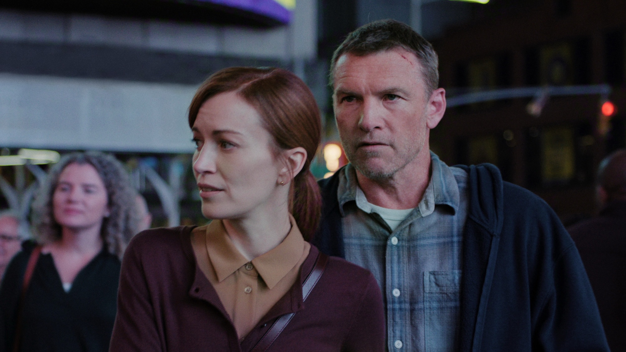 I Will Find You. (L to R) Britt Lower as Rachel Mills and Sam Worthington as David Burroughs in Episode #102 of I Will Find You. Cr. Courtesy of Netflix &amp;copy; 2025