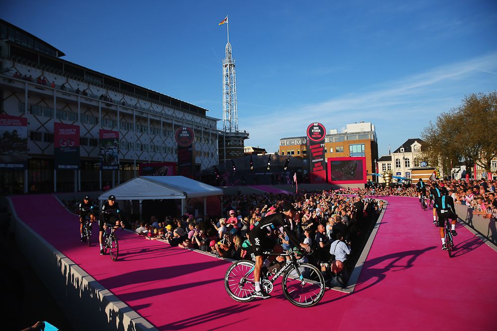 Team Sky rides onto the main stage in Apeldoorn at the Giro d'Italia teams presentation.