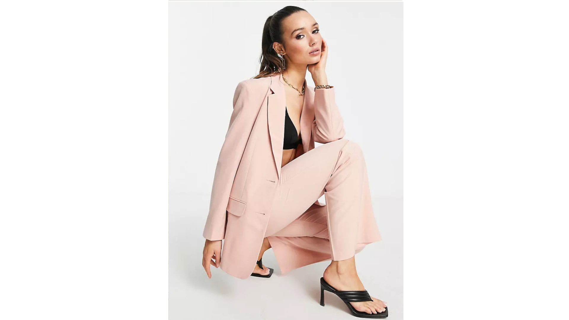 brunette model wearing ASOS Design Mix & Match Slim Boy Suit in Blush