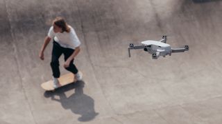 Best cheap drone: DJI Mavic Mini tracking a skateboarder from above