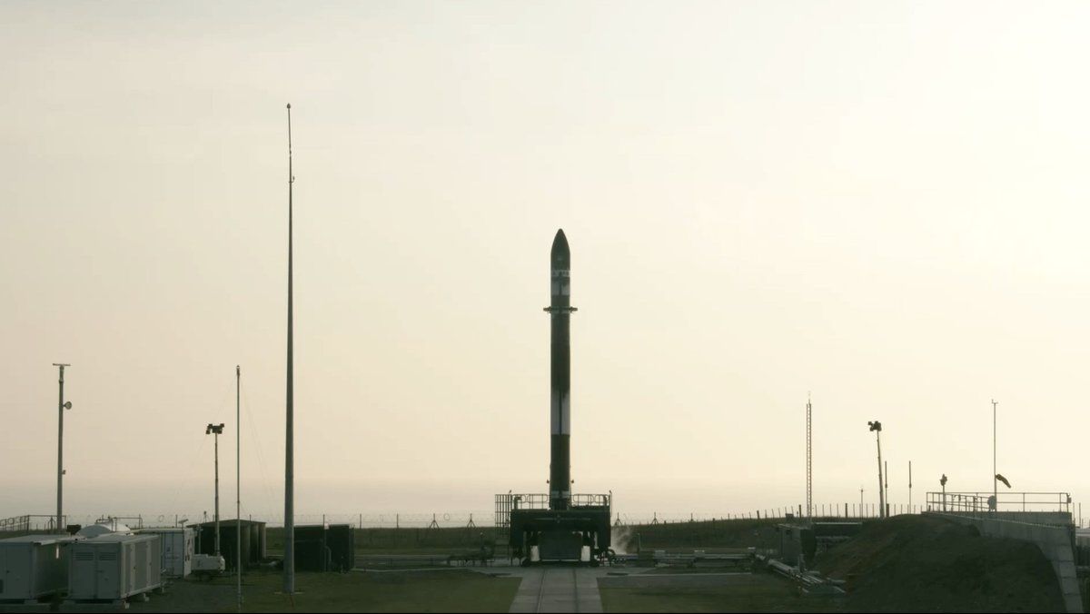 Rocket Lab&#039;s Electron rocket stands ready for launch at the Mahia Peninsula in New Zealand, but it will have to wait a few more days to fly while the company conducts additional ground tests.