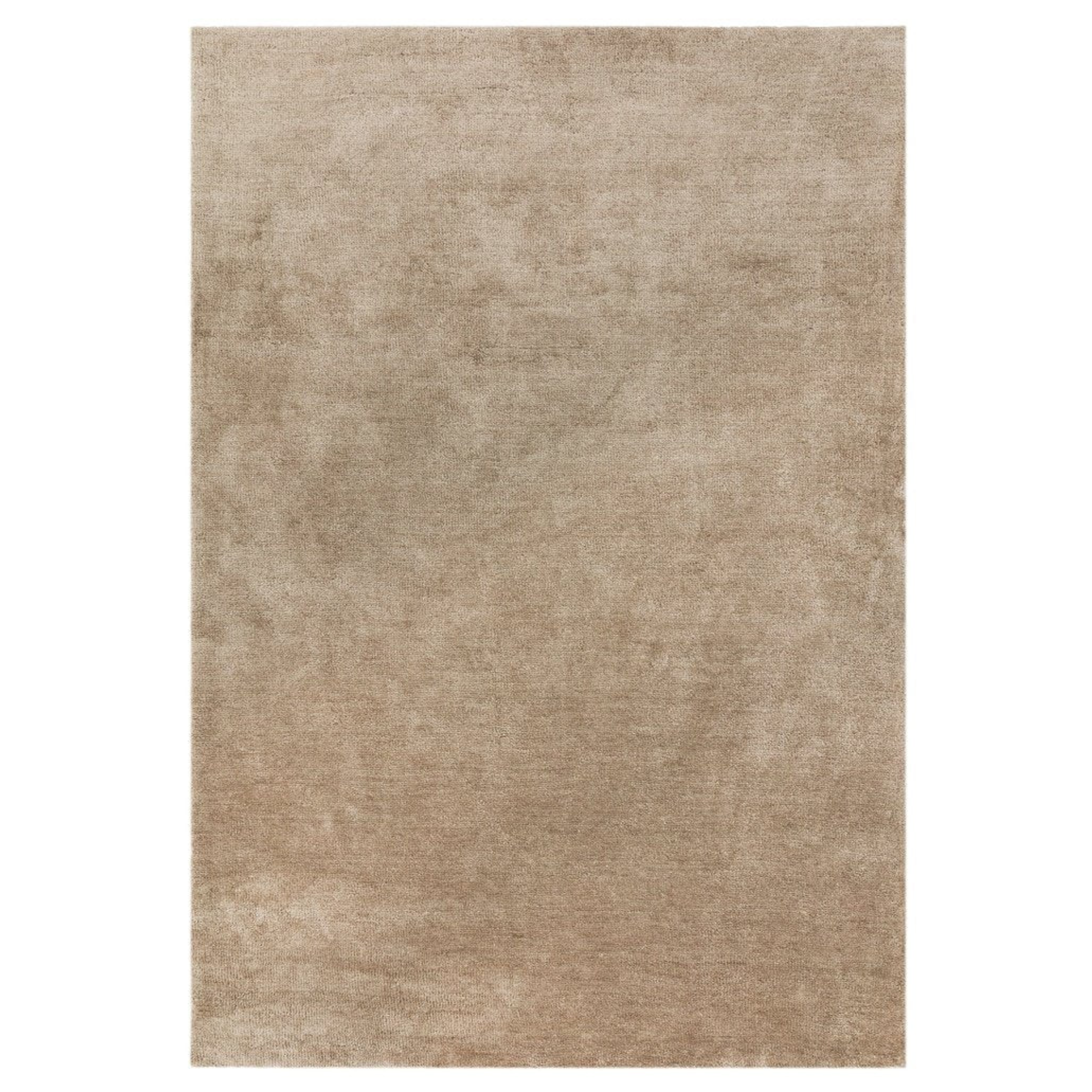 a light beige rectangular rug