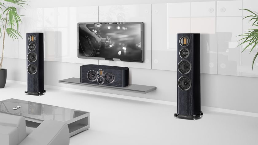 Wharfedale Evo 4.4 towers flanking a wall-mounted TV