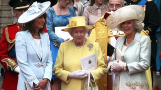 Carole Middleton, Queen Elizabeth II and Camilla, Duchess of Cornwall speak following the marriage of Prince William, Duke of Cambridge and Catherine, Duchess of Cambridge at Westminster Abbey on April 29, 2011 in London, England. The marriage of the second in line to the British throne was led by the Archbishop of Canterbury and was attended by 1900 guests, including foreign Royal family members and heads of state. Thousands of well-wishers from around the world have also flocked to London to witness the spectacle and pageantry of the Royal Wedding.