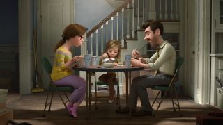 Riley and her parents sit at the dinner table in Inside Out
