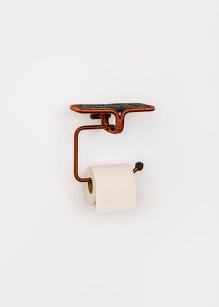 Toilet roll holder by Nifemi Marcus Bello