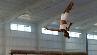 Simone Biles mid-flip, in 'Simone Biles Rising'