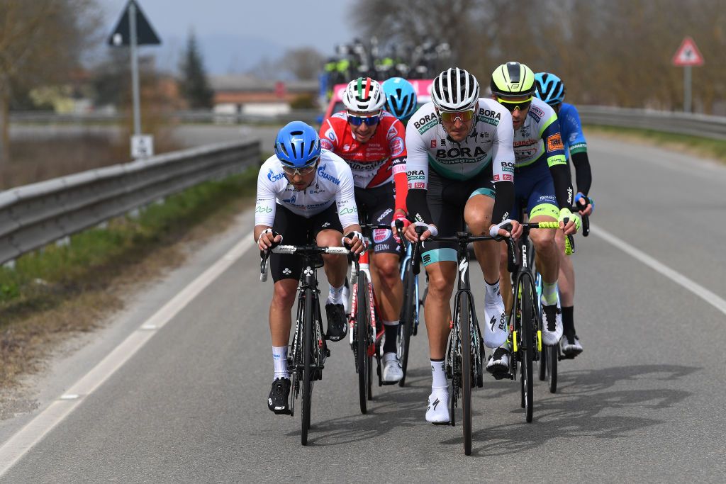 CHIUSDINO ITALY MARCH 11 Simone Velasco of Italy and Team Gazprom Rusvelo Simon Pellaud of Switzerland and Team Androni Giocattoli Sidermec Marcus Burghardt of Germany and Team Bora Hansgrohe during the 56th TirrenoAdriatico 2021 Stage 2 a 202km stage from Camaiore to Chiusdino 522m Breakaway TirrenoAdriatico on March 11 2021 in Chiusdino Italy Photo by Tim de WaeleGetty Images