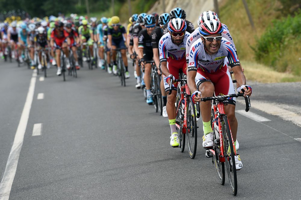 Katusha leads the bunch during stage 15.