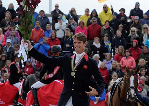 William Fox-Pitt collects his bronze medal from the European Eventing Championships