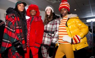 In the women’s collection, an oversized plaid coat with a fur collar made for a funky, yet chic look.