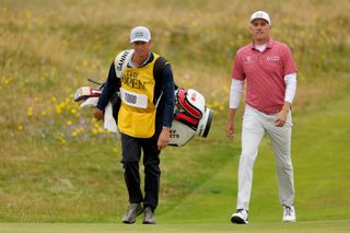 Brendon Todd of the United States and his caddie JT Griffin walk on the fifth hole during day three of The 152nd Open championship at Royal Troon on July 20, 2024 in Troon, Scotland.