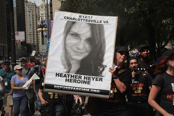 A poster with Heather Heyer&amp;#039;s picture on it.