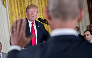 U.S. President Donald Trump spoke to the National Space Council in the East Room of the White House in Washington, D.C. on June 18, 2018.