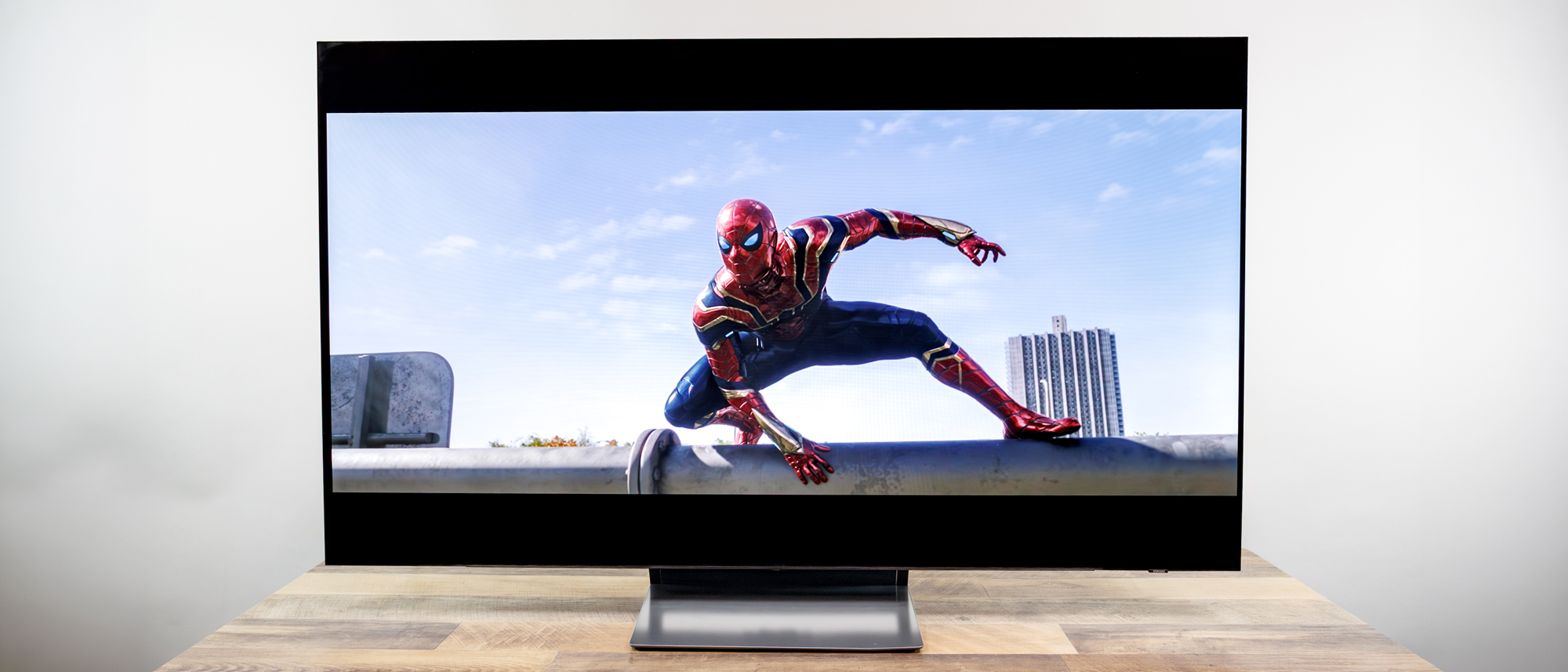 Samsung OLED S90H 4K TV on a desk