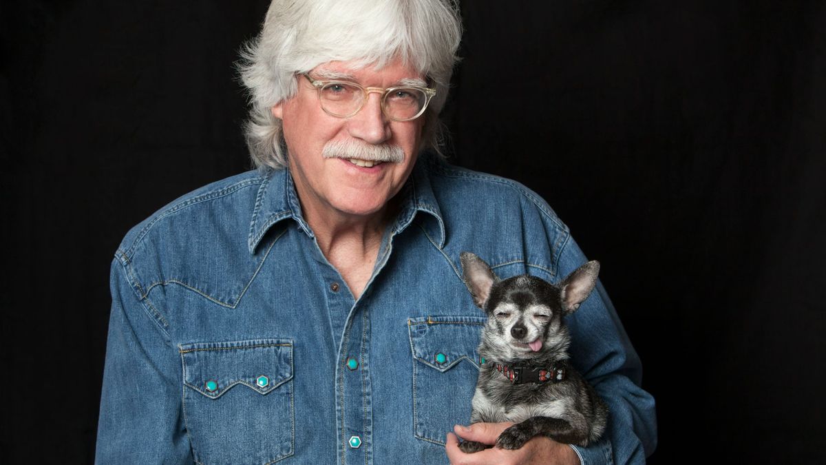 Kevin Fitzgerald holding a dog