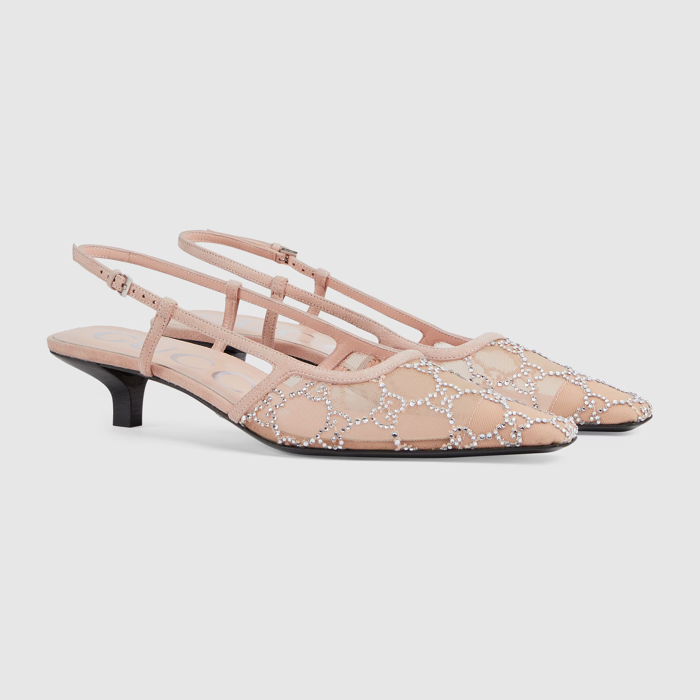 An image of Gucci slingback mules.