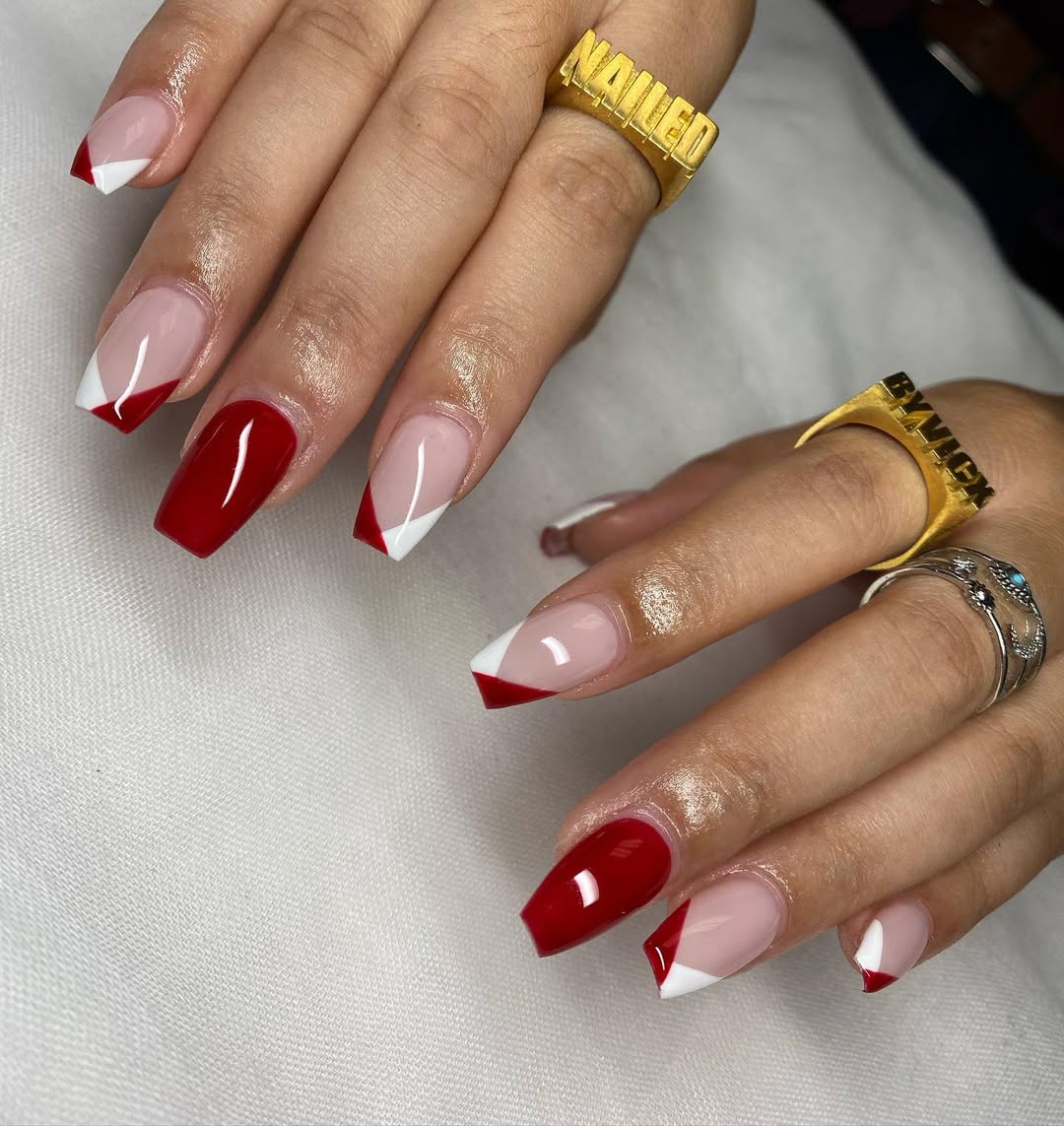 a criss cross french manicure with red and white tips