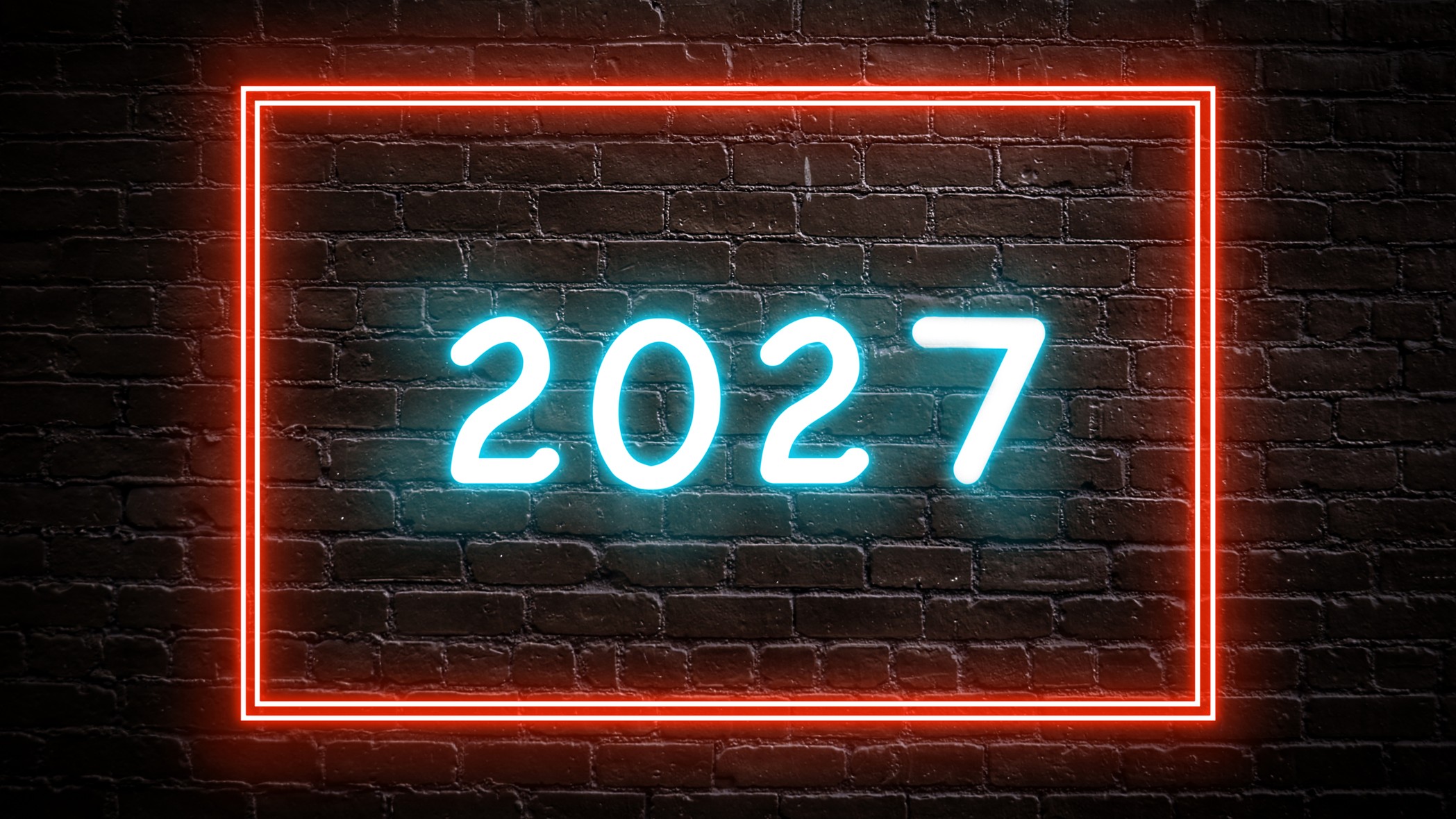 A glowing neon icon showing the year "2027" on a brick wall background.