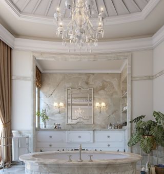 A modern bathroom with a crystal chandelier