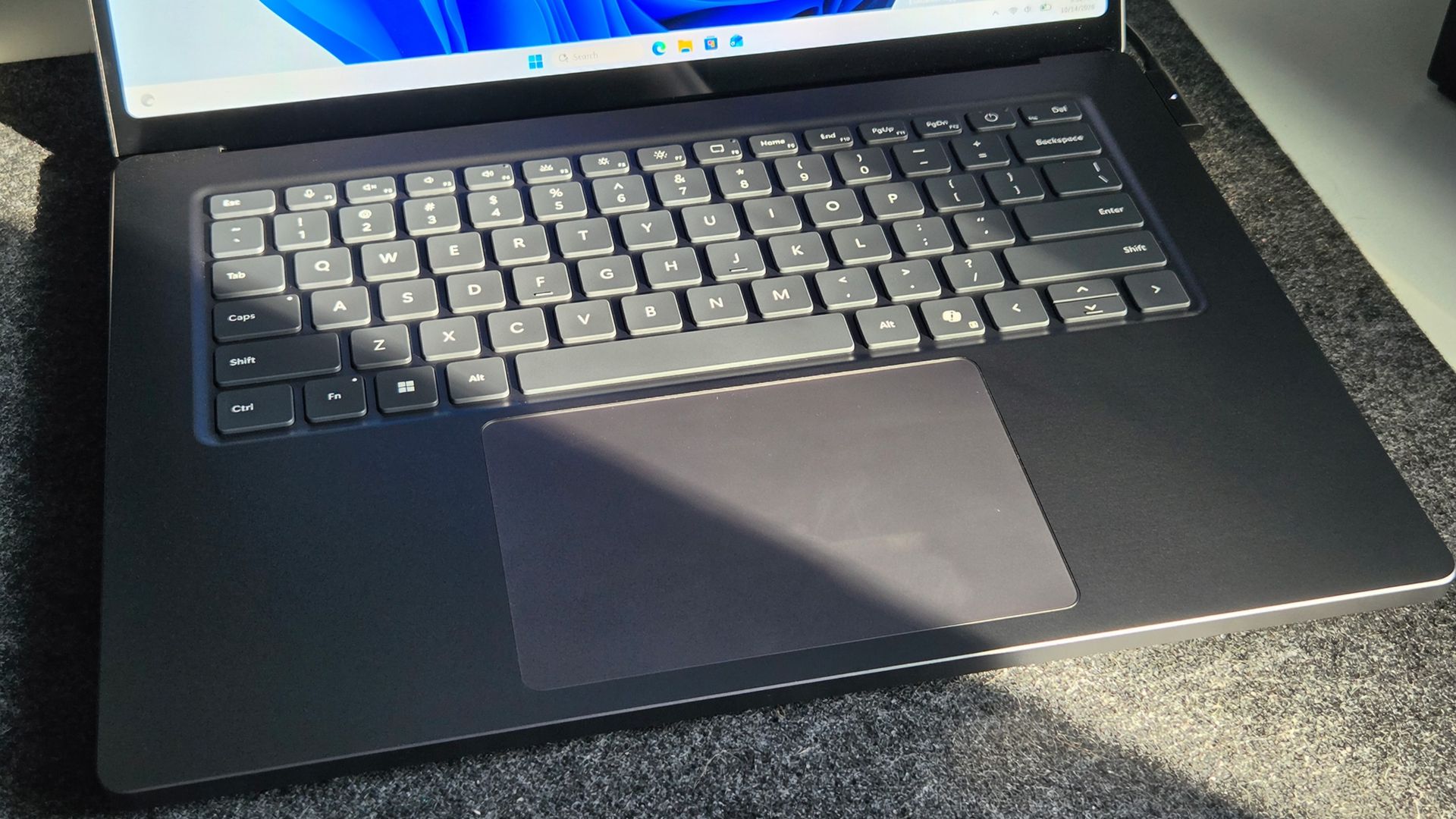 Surface Laptop Ultra keyboard with sunlight on