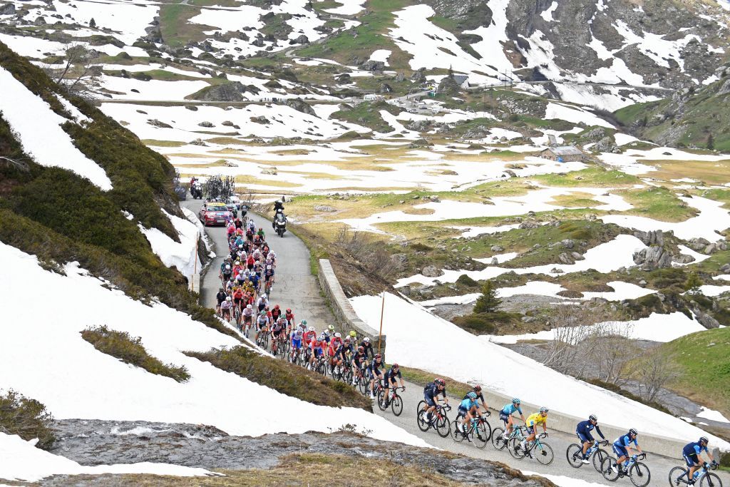 The pack rides during the seventh stage of the 73rd edition of the Criterium du Dauphine cycling race a 171km between SaintMartinLeVinoux and La Plagne on June 5 2021 Photo by Alain JOCARD AFP Photo by ALAIN JOCARDAFP via Getty Images
