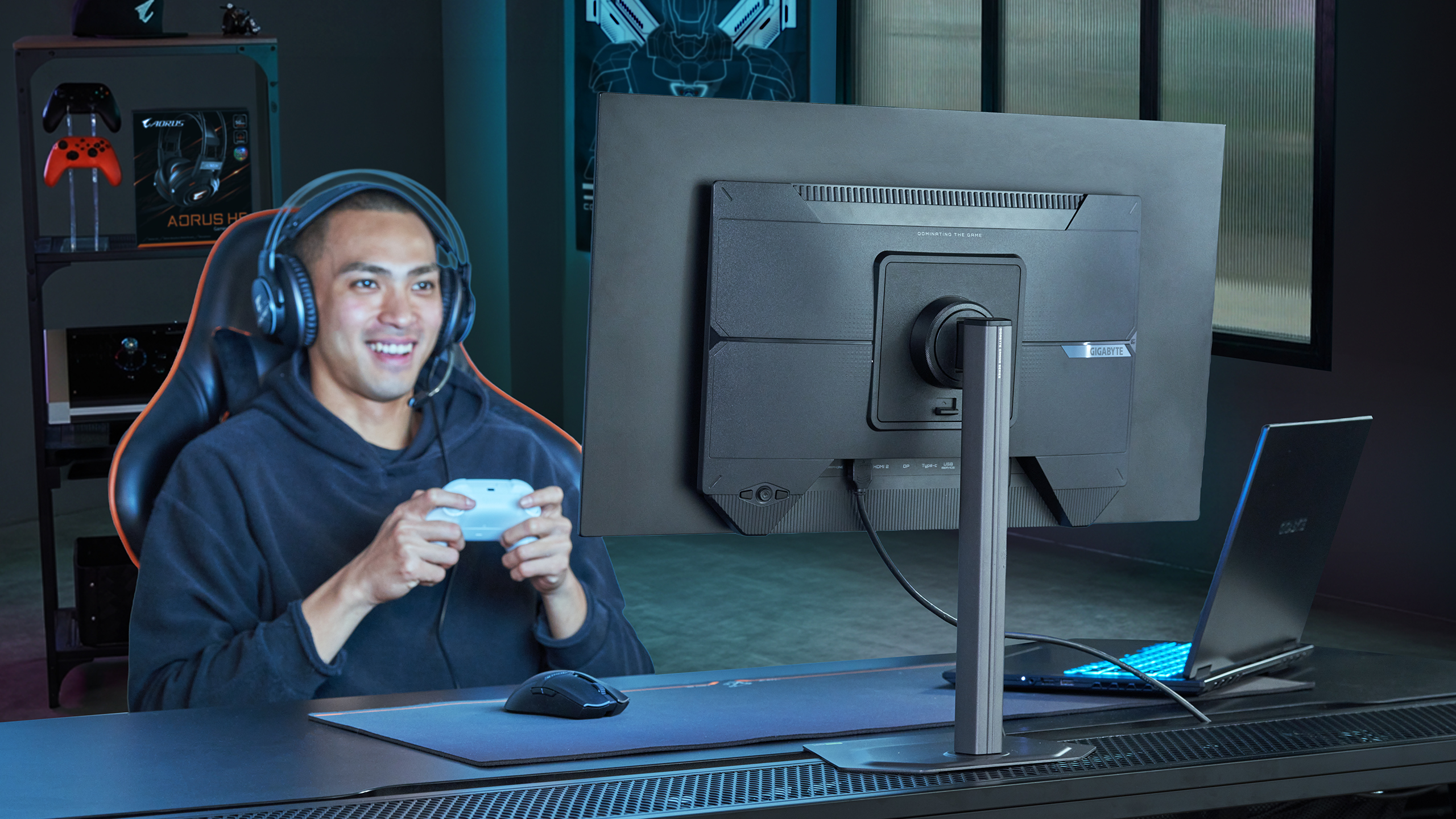 A gamer using a Gigabyte monitor