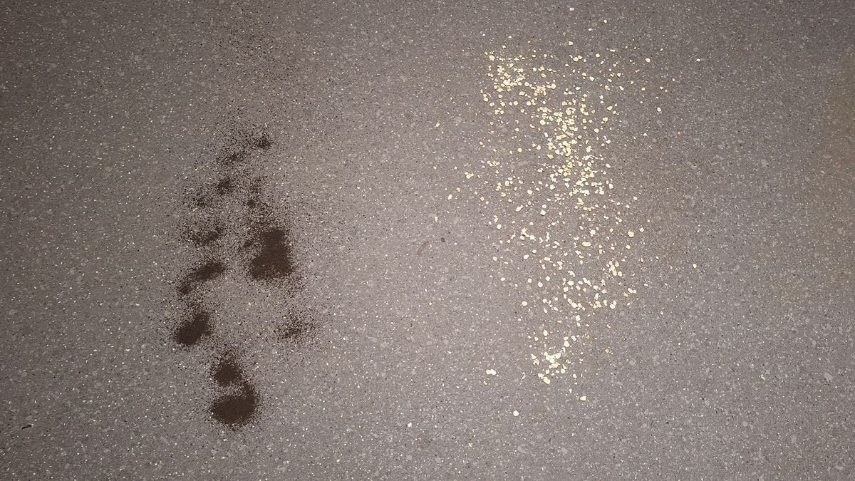 Tea and oats on a lino floor before suction test