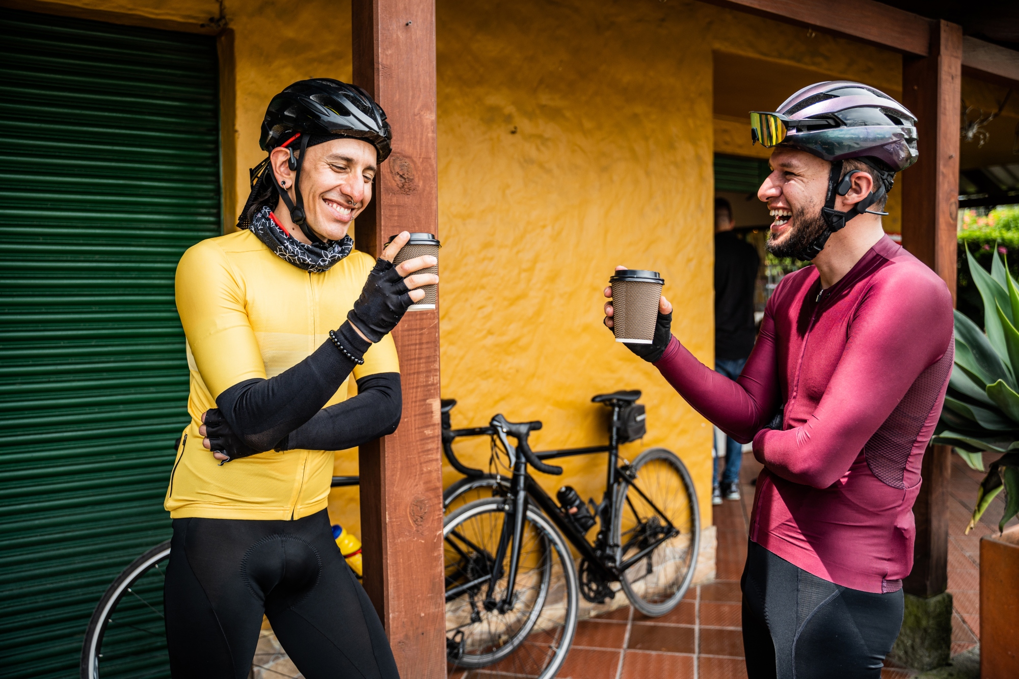 Cyclists drinking coffee