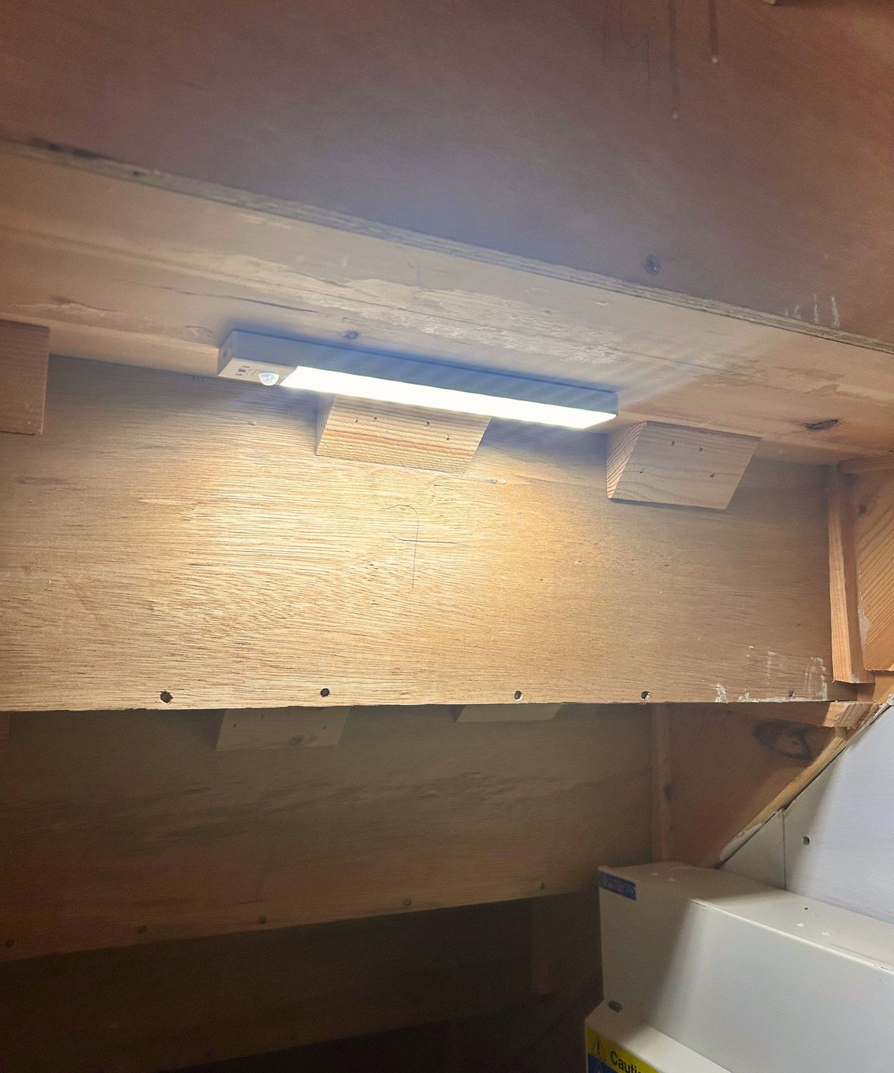 Under the stairs cupboard with a lighting panel installed