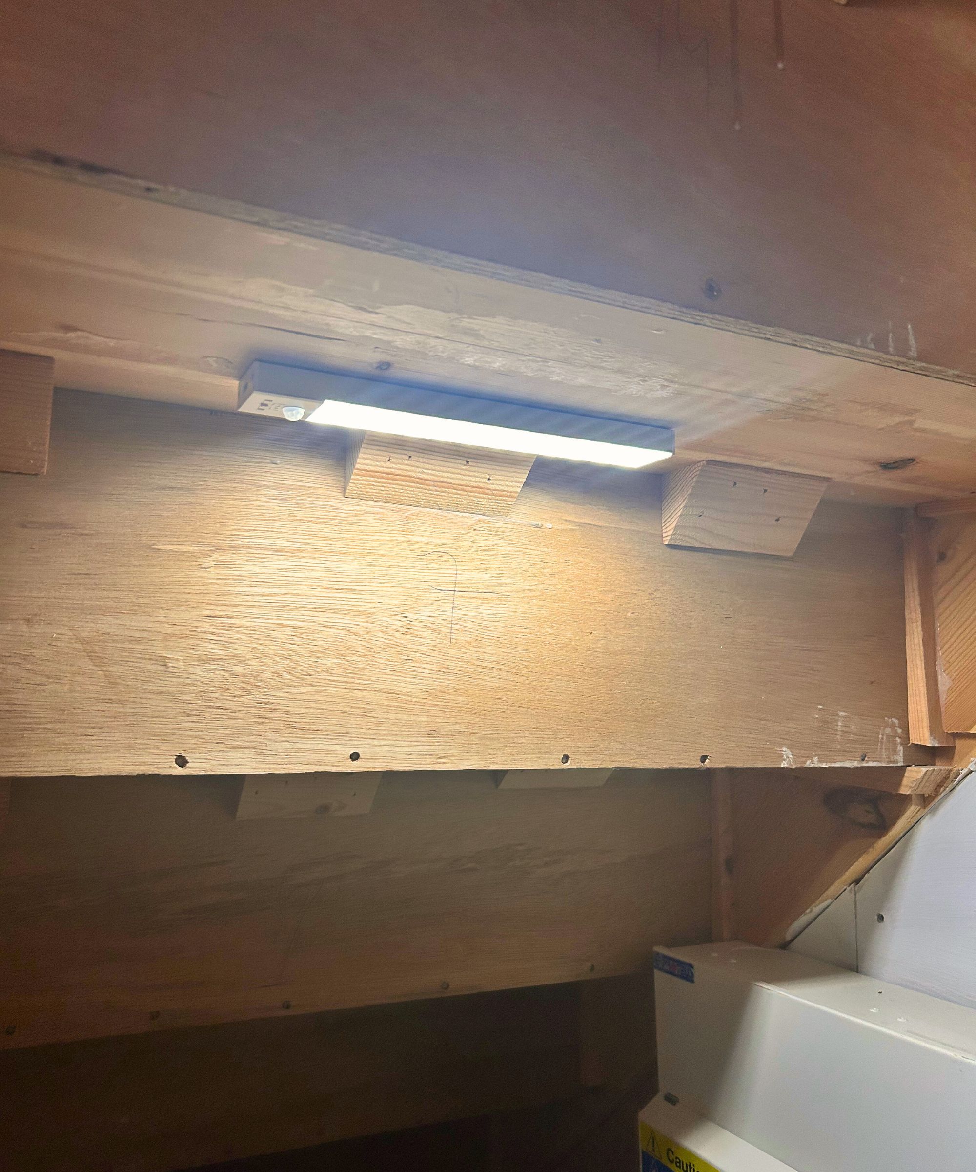 Under the stairs cupboard with a lighting panel installed