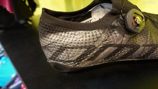 The rim of the DMT KR1 is reminiscent of a soccer/football shoe with the sock-like material